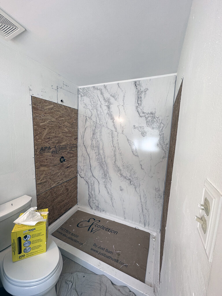 Your Big Bathroom Conversions Guide 1 A bathroom conversion project in the demolition stage. The old tub was removed and a new shower base placed.